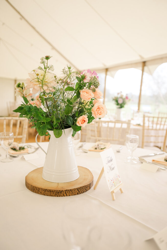 Spring floral arrangement on wedding guest table