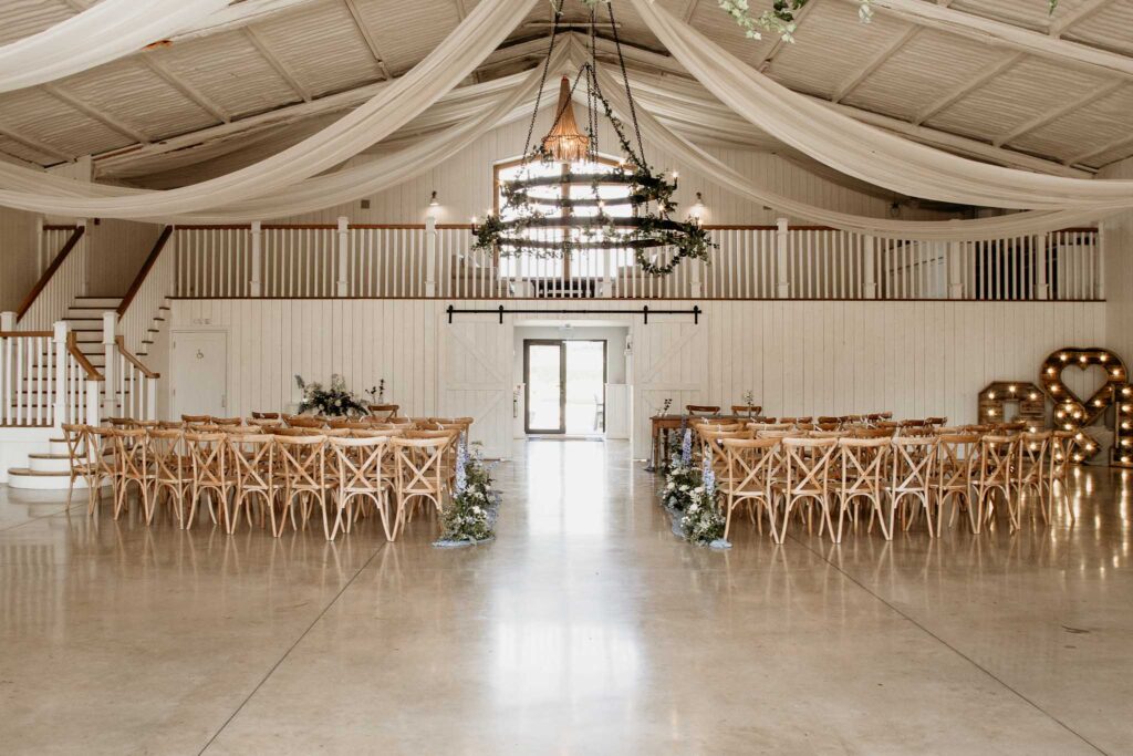 Interior of the The White Barn in South Petherton set out for a wedding ceremony.