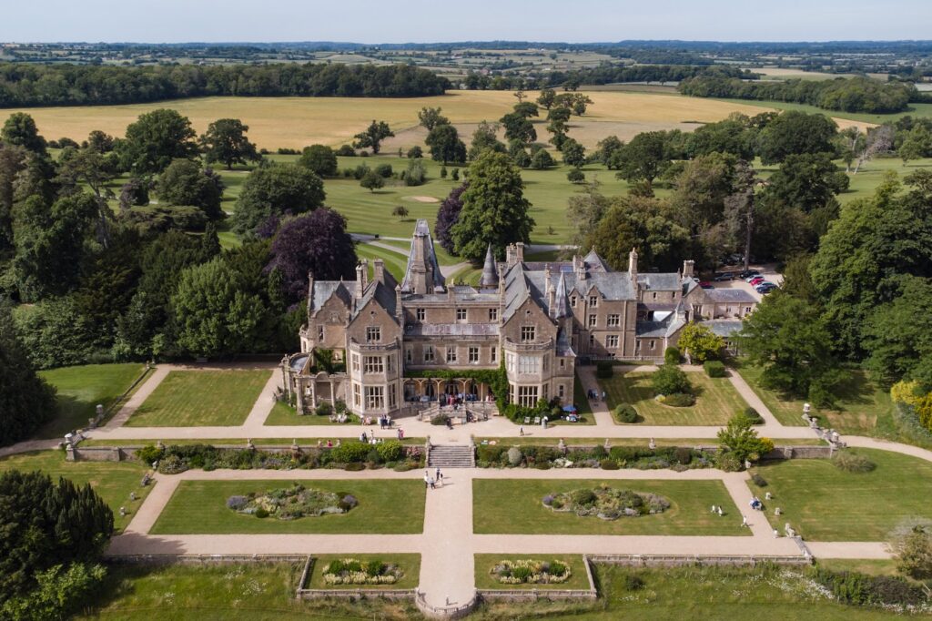 A birds eye view of elegant country house used as a wedding venue