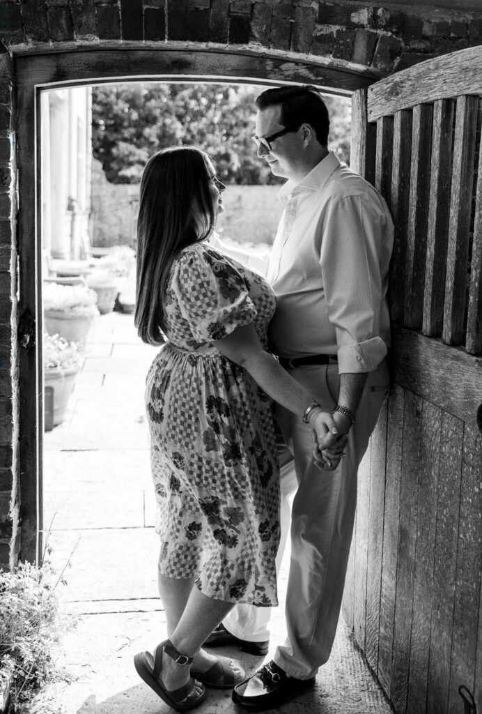 Cuddling up at a Pre Wedding photoshoot in Tintinhull Garden